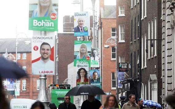 election posters on the street illustrating the focus on electoral politics